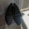 Ankelboots med kilklackar och snörning