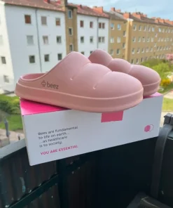 Beez ljusrosa slipin tofflor