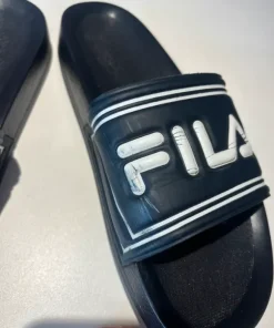 Blåa badtofflor