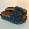 GUCCI monogram denim sandals mules