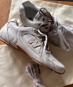 New Balance with Miu Miu trainers for woman
