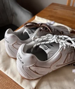 New Balance with Miu Miu trainers for woman