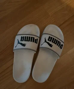 Puma tofflor