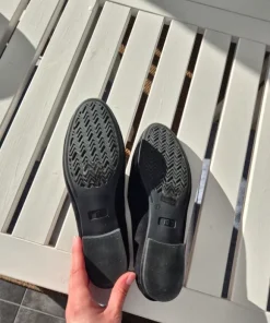 Svarta loafers med betsel